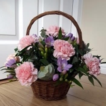 Pink and Lilac Basket Arrangement